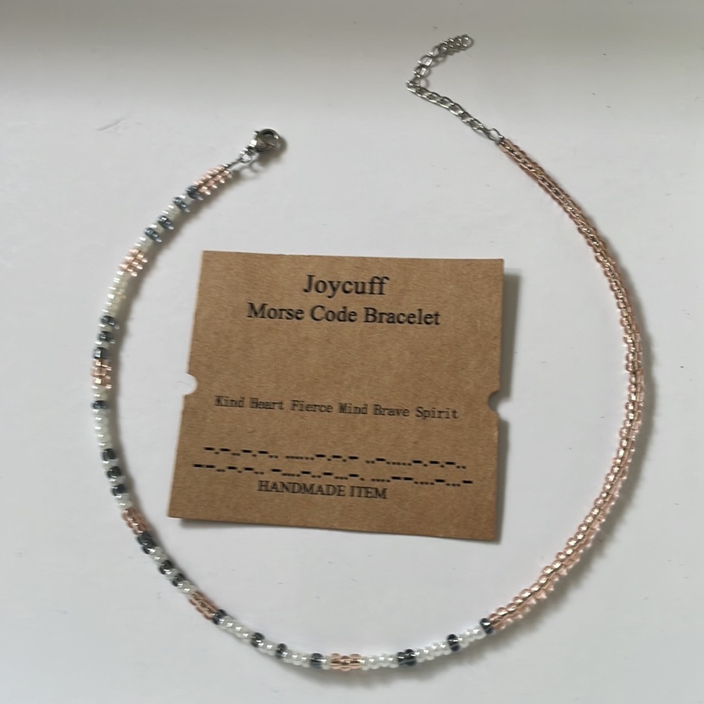Joycuff New in box morse code bracelet.